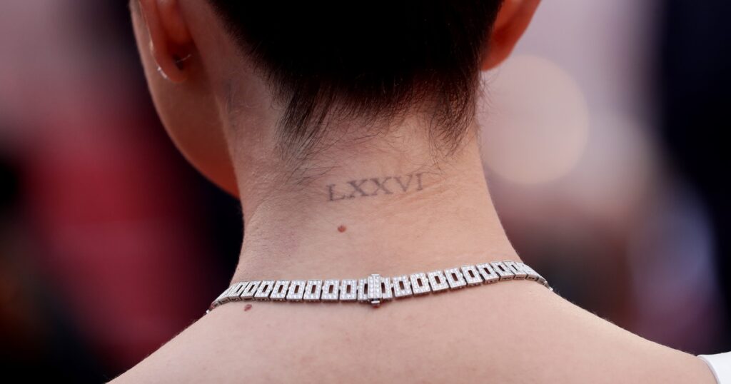 25 Idéias de tatuagem do pescoço