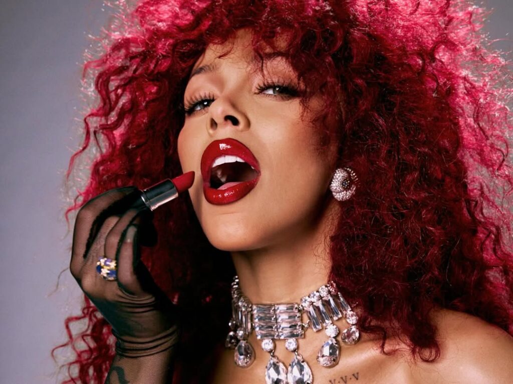 Doja Cat close up with red MAC lipstick on set of “Gorgeous” music video